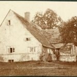 Sepia photograph of farmer William Smith with his family